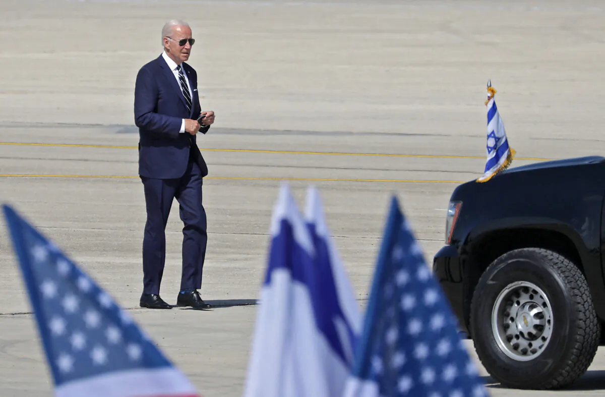 President Joe Biden prepares to board Air Force One at Israel's Ben Gurion Airport, on July 15, 2022. (Abir Sultar/AFP/Getty Images)