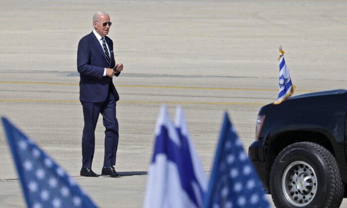 President Joe Biden prepares to board Air Force One at Israel's Ben Gurion Airport, on July 15, 2022. (Abir Sultar/AFP/Getty Images)