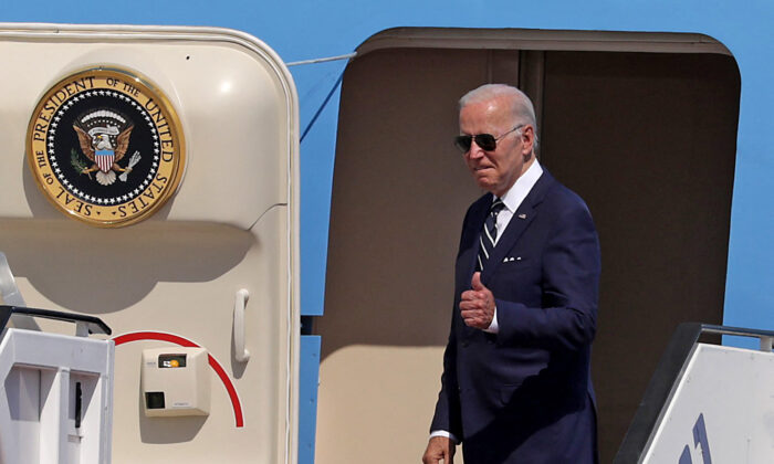 President Joe Biden gives a thumbs up before boarding Air Force One to depart Israel's Ben Gurion Airport on July 15, 2022. (Abir Sultan/AFP/Getty Images)