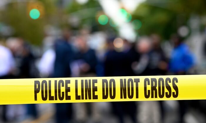 Police tape secures a crime scene outside a club after a shooting in Brooklyn, New York, on Oct. 12, 2019. (Johannes Eisele/AFP via Getty Images)
