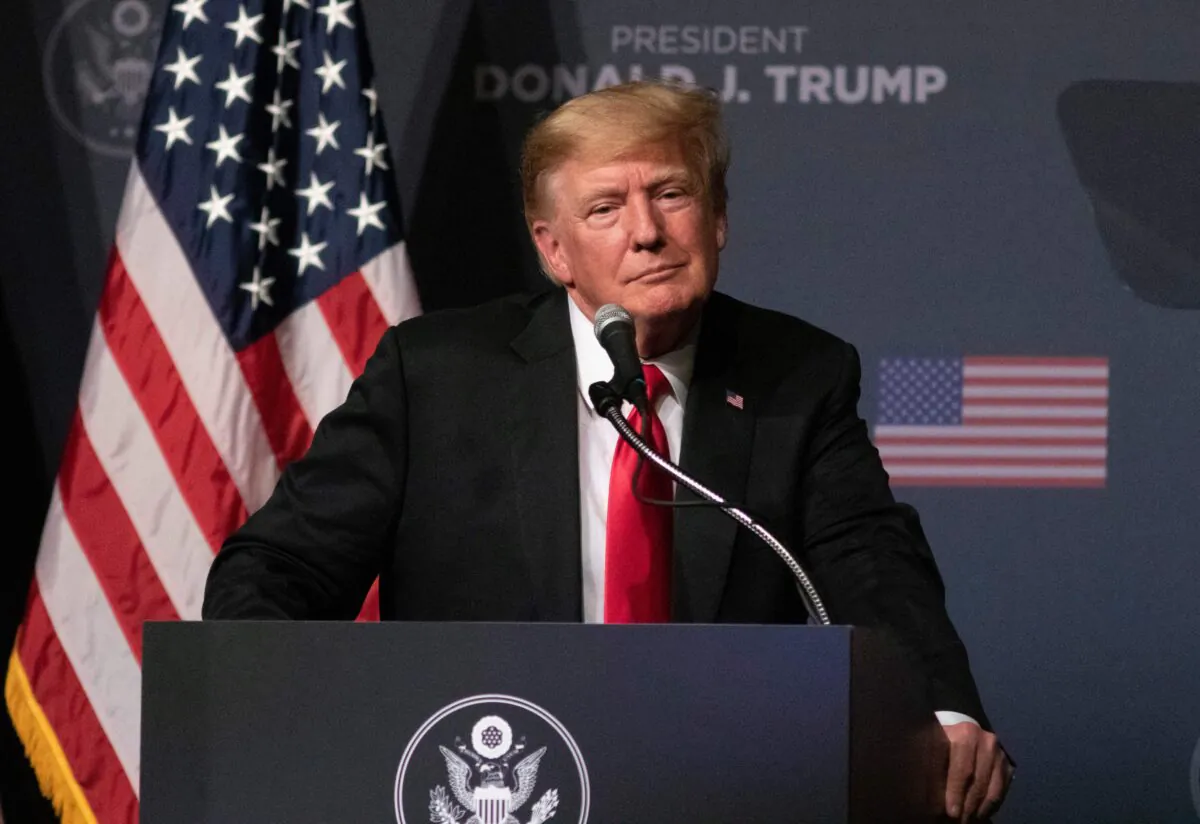 Former U.S. President Donald Trump pauses while speaking at a rally endorsing Republican candidates Adam Laxalt and Joe Lombardo in Las Vegas on July 8, 2022. (Ronda Churchill/AFP via Getty Images)