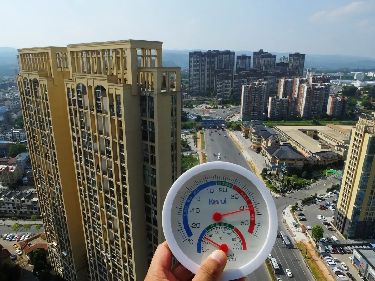 A thermometer shows the surface temperature exceeded 41 °C (105.8°F) in Yichang, Hubei Province, China, on July 14, 2022. (CFOTO/Future Publishing via Getty Images)