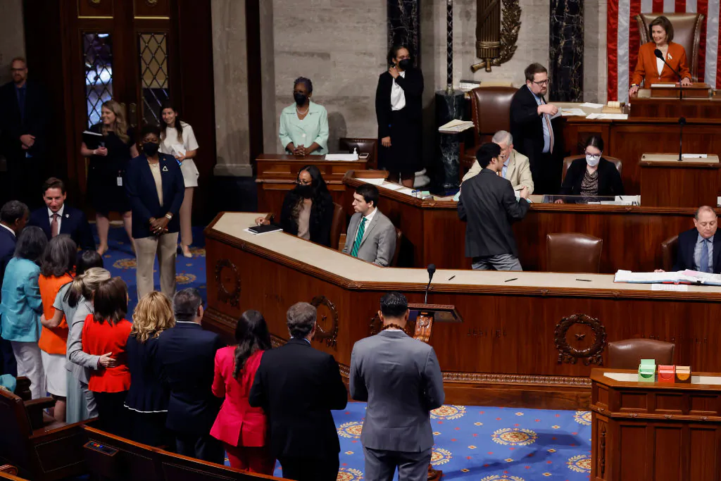 Democratic lawmakers gather as  Speaker  Nancy Pelosi (D-Calif.) announces the final vote count for the Bipartisan Safer Communities Act in the House of Representatives on June 24, 2022.  (Chip Somodevilla/Getty Images)