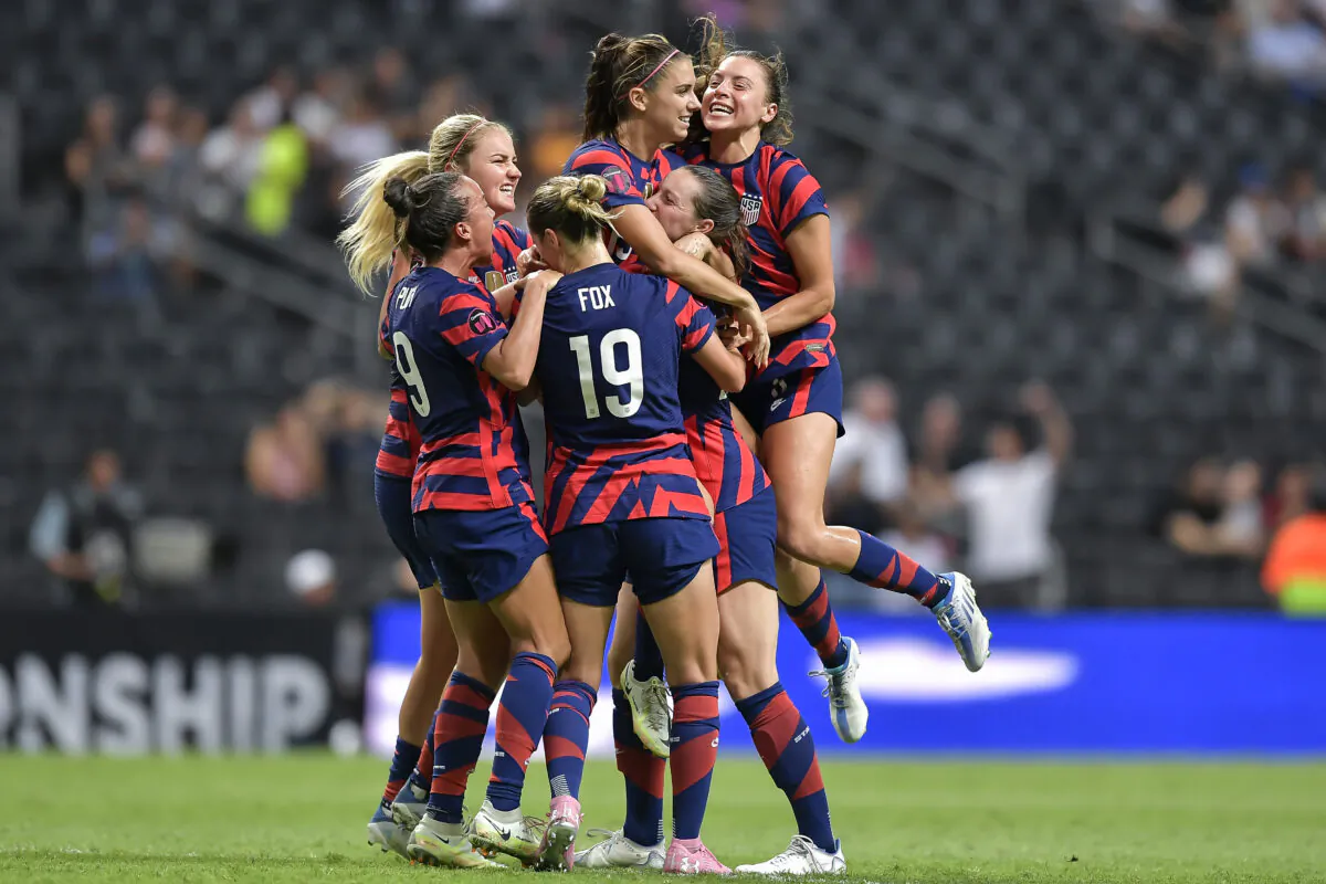 Alex Morgan of the U.S. national soccer team celebrates with teammates after scoring their first goal during the championship match between United States and Canada as part of the 2022 Concacaf W Championship at BBVA Stadium, in Monterrey, Mexico, on July 18, 2022. (Azael Rodriguez/Getty Images)