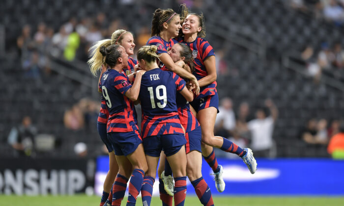 Alex Morgan of the U.S. national soccer team celebrates with teammates after scoring their first goal during the championship match between United States and Canada as part of the 2022 Concacaf W Championship at BBVA Stadium, in Monterrey, Mexico, on July 18, 2022. (Azael Rodriguez/Getty Images)