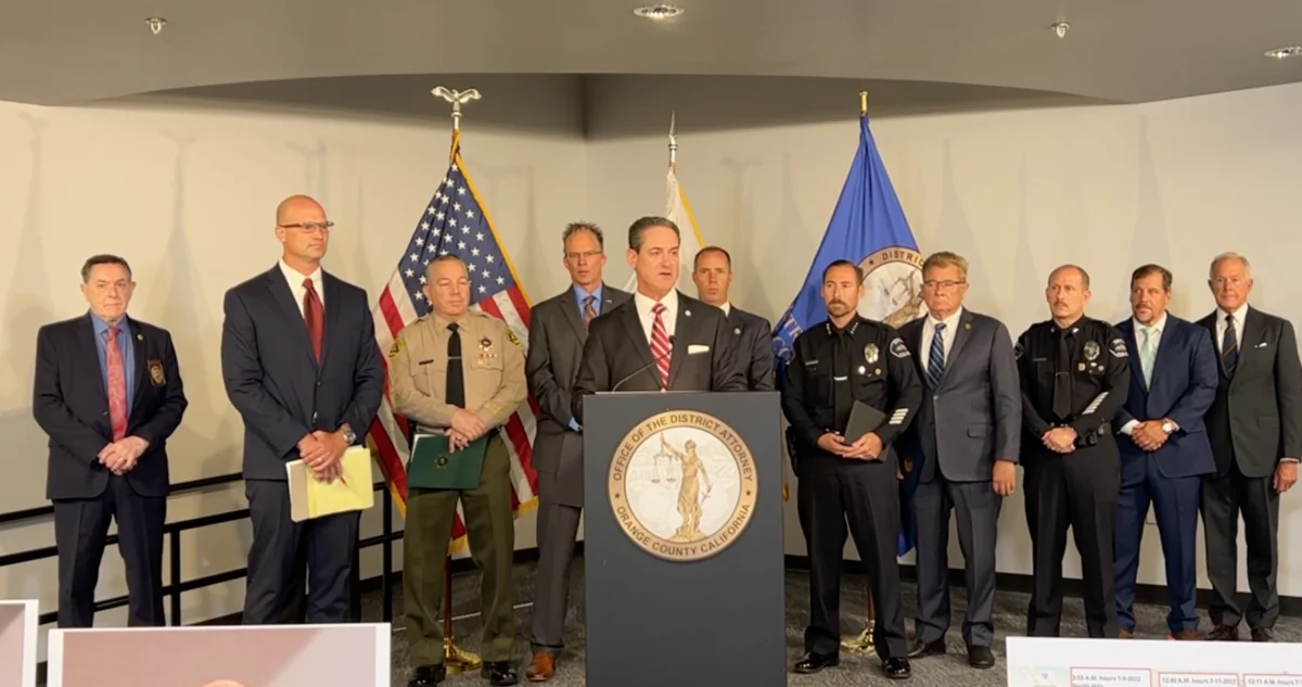 Orange County District Attorney Todd Spitzer (C) and other law enforcement officials speak about a plan to charge a Los Angeles man in connection with a deadly robbery spree at a half-dozen 7-Elevens and a doughnut shop at a news conference in Santa Ana, Calif., on July 18, 2022. (Screenshot via Facebook/Orange County District Attorney Todd Spitzer)