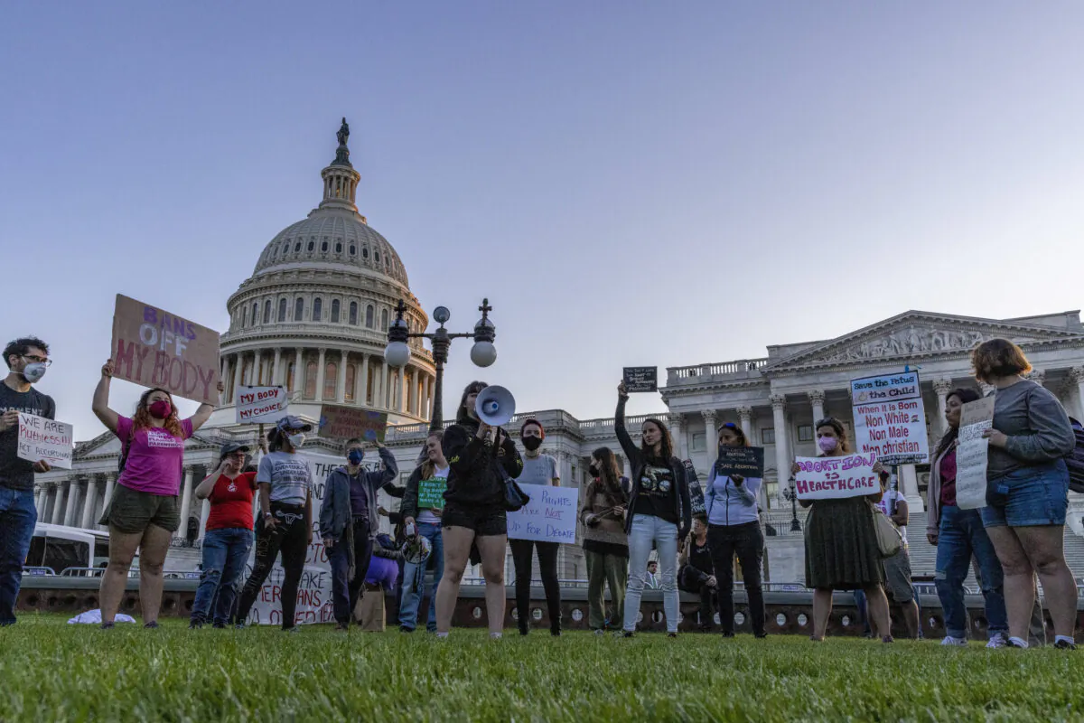 Abortion-rights demonstrators protest in front of the U.S. Supreme Court building in Washington, D.C., on May 10, 2022. (Tasos Katopodis/Getty Images)
