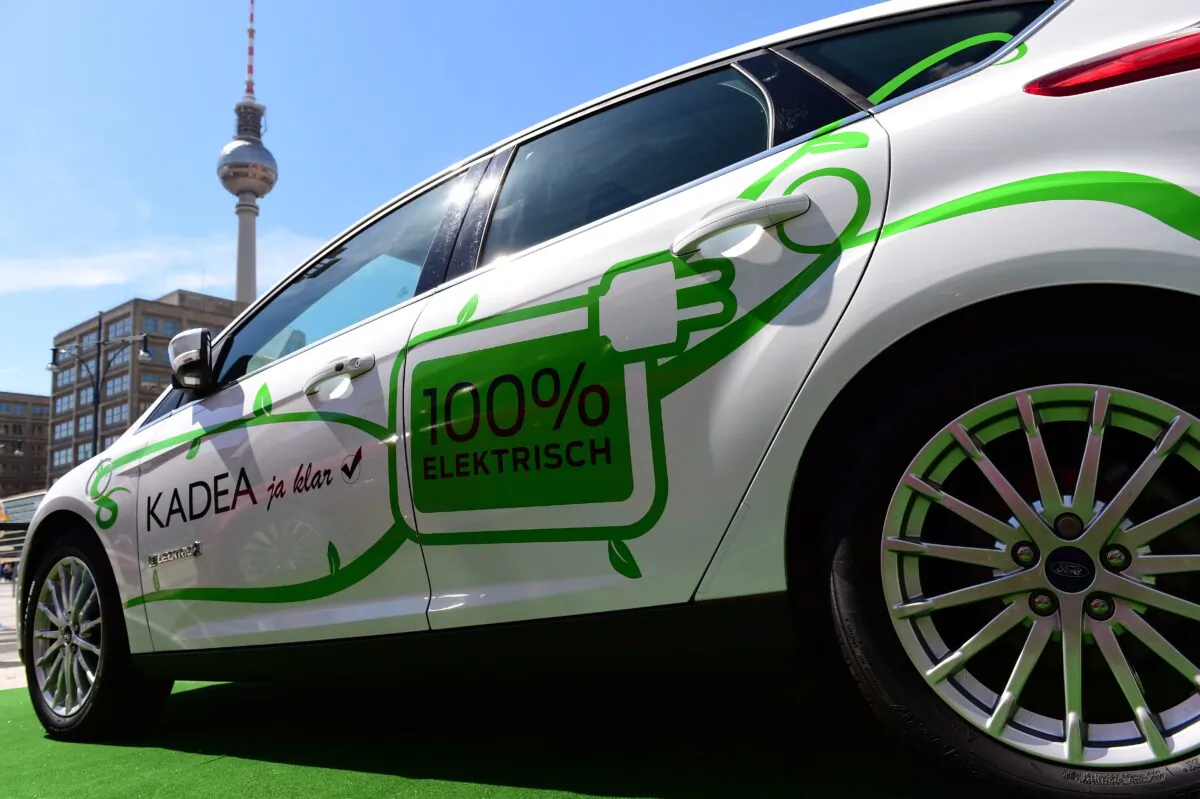 An electric Ford Focus model is on display in front of the Berlin Congress Centre during a two-day national conference on "Electro-mobility" or electric vehicles, in Berlin, Germany, on June 15, 2015. (John Macdougal/AFP via Getty Images)