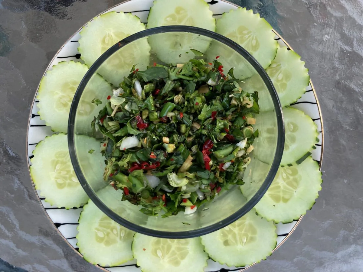 Bunches of fresh herbs, aromatics, chile, and umami-packed fish sauce combine into a punchy condiment to scoop over everything. (Ari LeVaux)