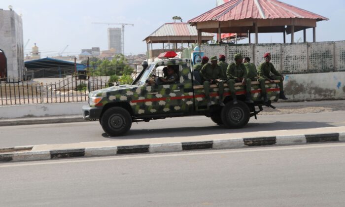 Somali government soldiers on a Military vehicle are seen outside the SYL hotel in Mogadishu on Dec. 11, 2019. (Abdirazak Hussein Farah/AFP via Getty Images)