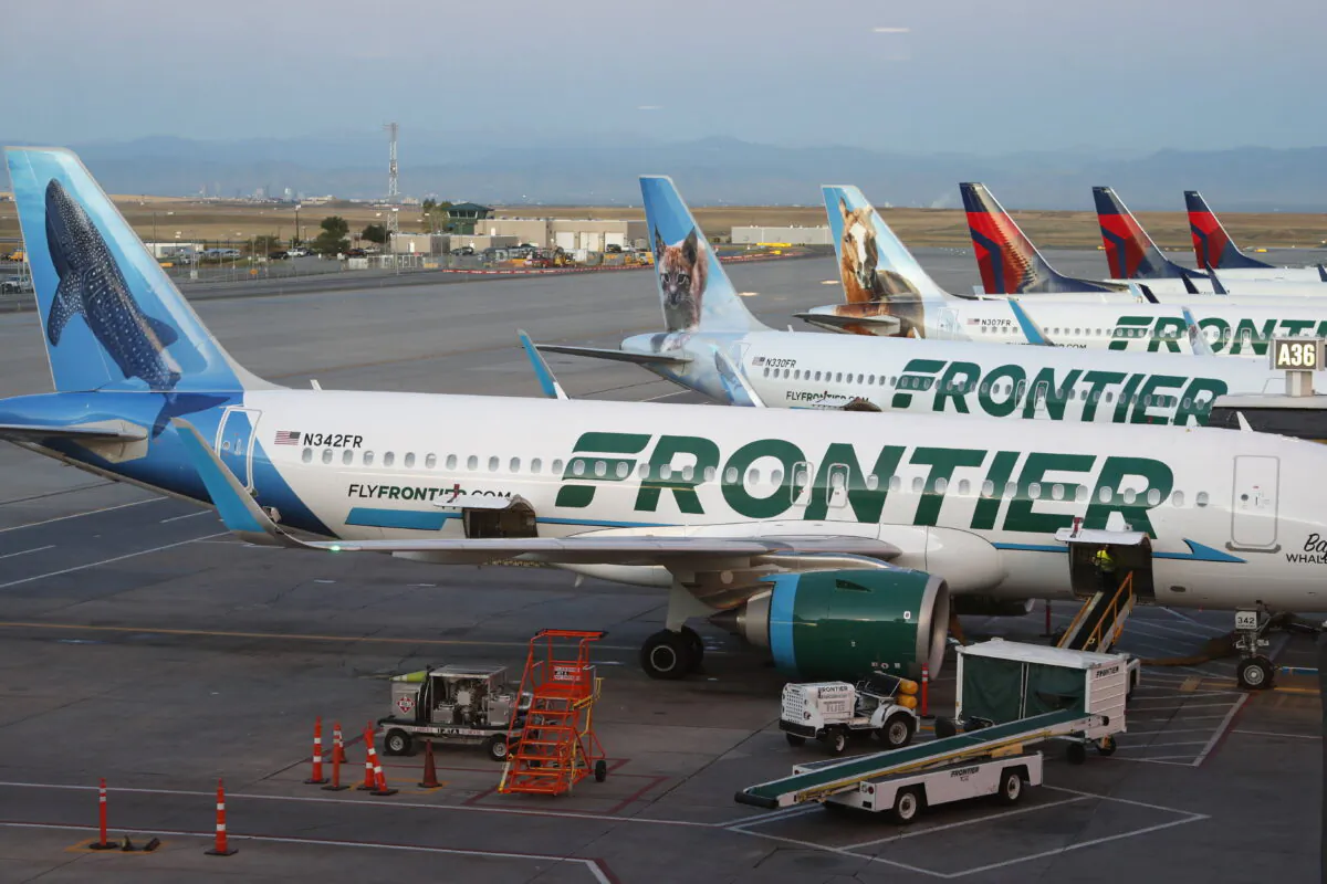 Frontier Airlines jets sit at gates at Denver International Airport on Sept. 22, 2019, in Denver. (David Zalubowski/AP Photo)