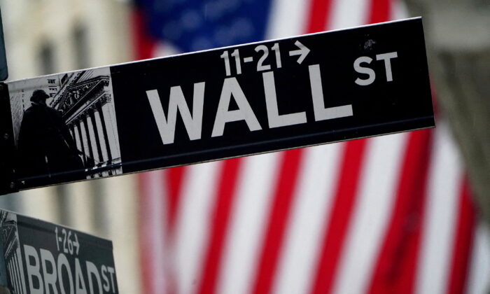 A Wall Street sign outside the New York Stock Exchange in New York City, N.Y., on Oct. 2, 2020. (Carlo Allegri/Reuters)
