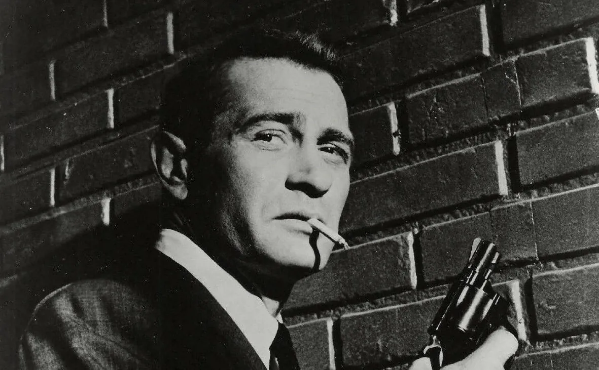 A file photo of Darren McGavin as Mike Hammer in Mickey Spillane's Mike Hammer (1958). The first movie featuring the character Mike Hammer, played by Biff Elliot, was "I, the Jury," in 1953. (Public Domain)