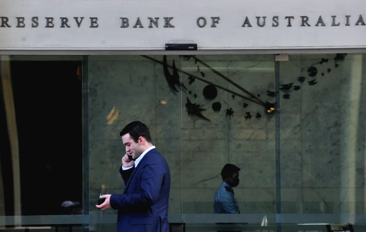 A man walks past the Reserve Bank of Australia in Sydney, Australia, on June 7, 2022. (Muhammad Farooq/AFP via Getty Images)