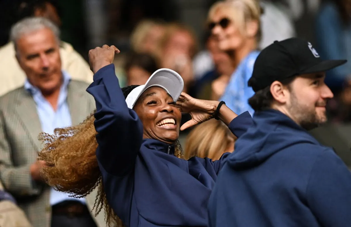 U.S. player and sister of Serena Williams, Venus Williams reacts as she arrives to attend her sister's women's singles tennis match against France's Harmony Tan on the second day of the 2022 Wimbledon Championships at The All England Tennis Club in Wimbledon, southwest London, on June 28, 2022. (Glyn Kirk/AFP via Getty Images)