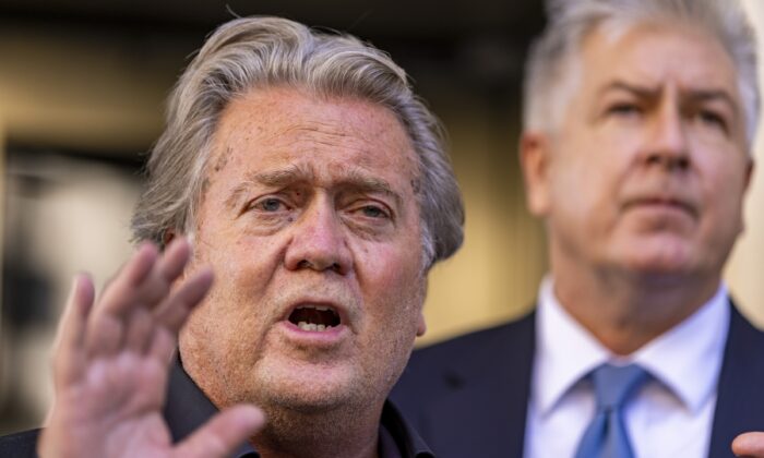 Former White House Chief Strategist Steve Bannon speaks to the media as his lawyer Matthew Evan Corcoran looks on after his trial for contempt of Congress began at the U.S. District Courthouse in Washington on July 19, 2022. (Tasos Katopodis/Getty Images)