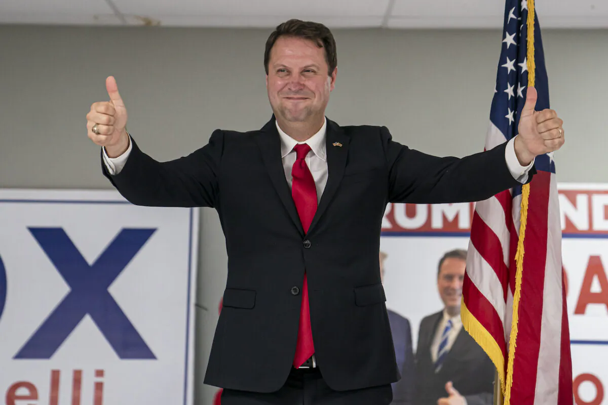 Dan Cox, a candidate for the Republican gubernatorial nomination, reacts to his primary win in Emmitsburg, Md., on July 19, 2022. (Nathan Howard/Getty Images)