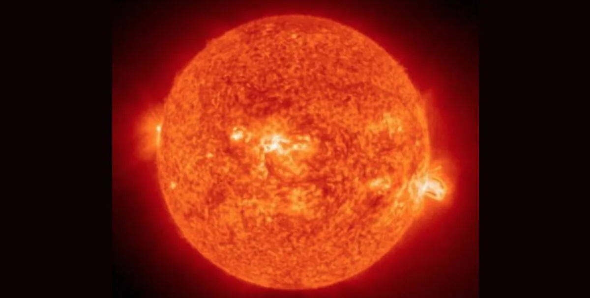 NASA image of a solar flare erupting from giant sunspot 649. (HO/Getty Images)