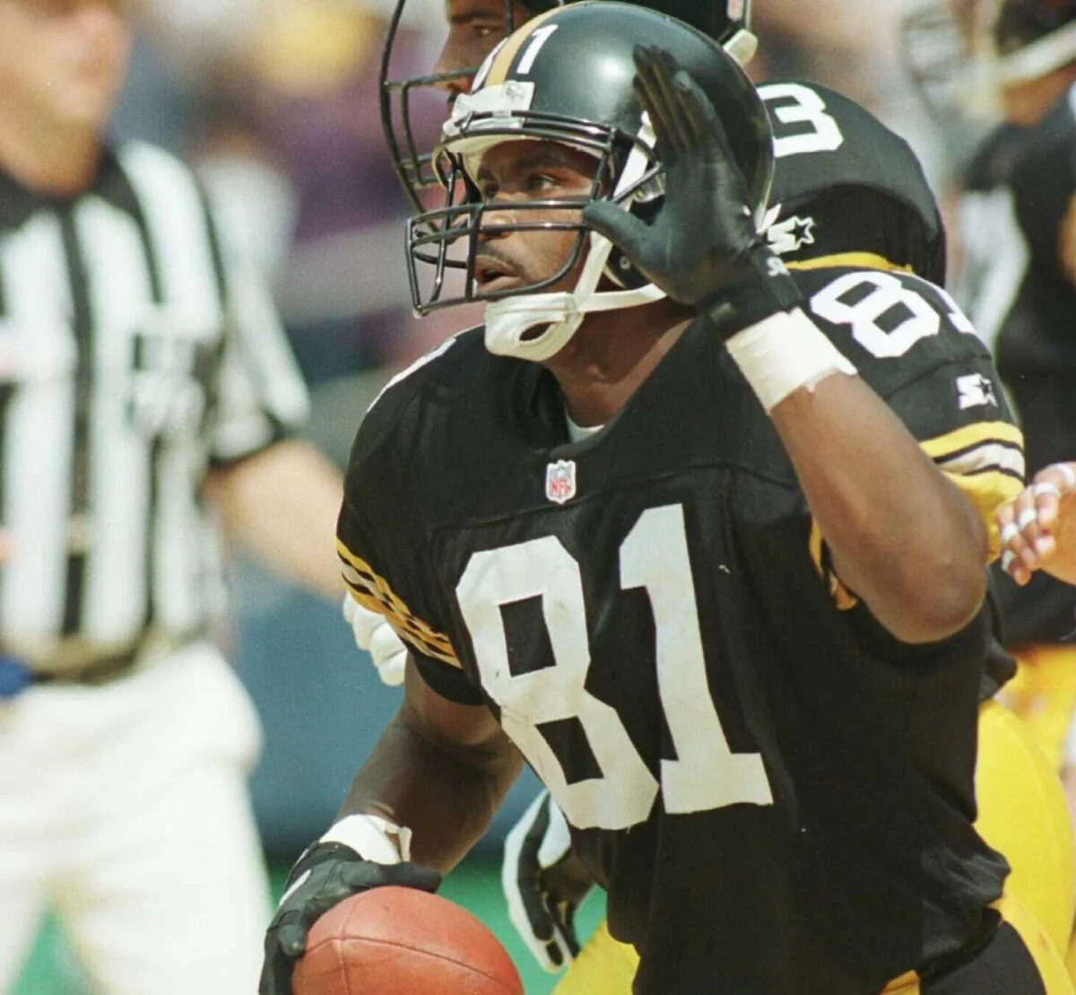 Charles Johnson #81 of the Pittsburgh Steelers celebrates scoring a touchdown in the second quarter of their game against the Baltimore Ravens at Three Rivers Stadium in Pittsburgh, Pa., on Sept. 8, 1996. (Jonathan Daniel/Allsport)