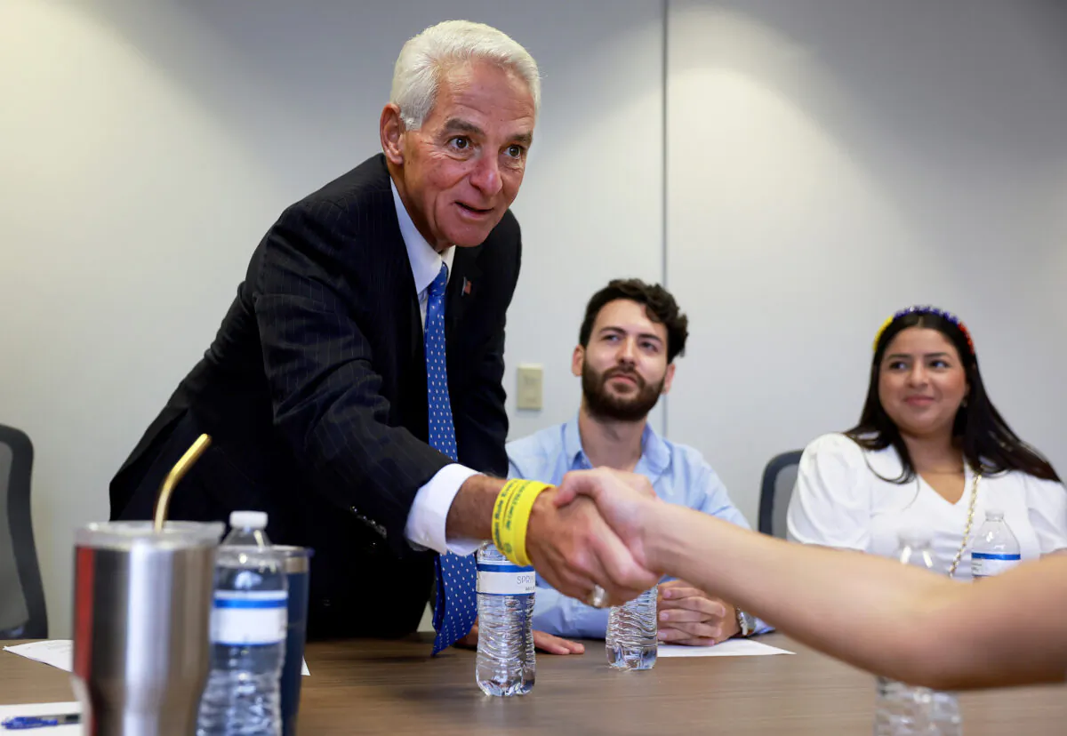 Democratic gubernatorial candidate Rep. Charlie Crist (D-FL) attends a round table discussion with Venezuelan immigrants about renewing Temporary Protected Status (TPS) for Venezuelans on July 06 in Miami. (Photo by Joe Raedle/Getty Images)