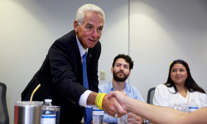 Democratic gubernatorial candidate Rep. Charlie Crist (D-FL) attends a round table discussion with Venezuelan immigrants about renewing Temporary Protected Status (TPS) for Venezuelans on July 06 in Miami. (Photo by Joe Raedle/Getty Images)