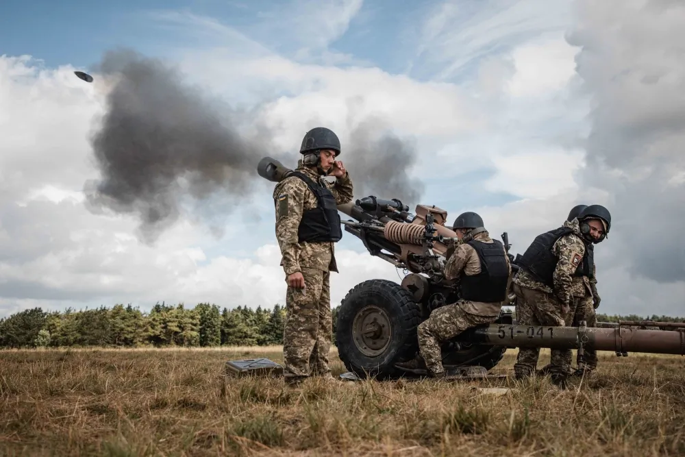 Undated handout photo of an artillery gun being fired, issued by the UK Ministry of Defence on June 25, 2022. (UK Ministry of Defence/PA Media)