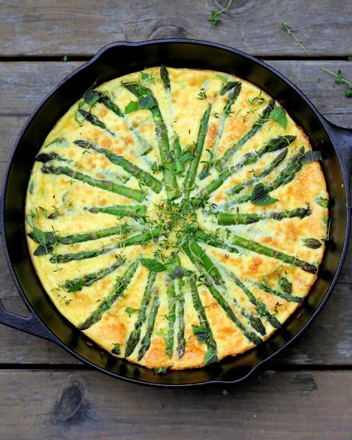 Asparagus spears give this easy egg dish a lovely presentation. (Lynda Balslev for Tastefood)