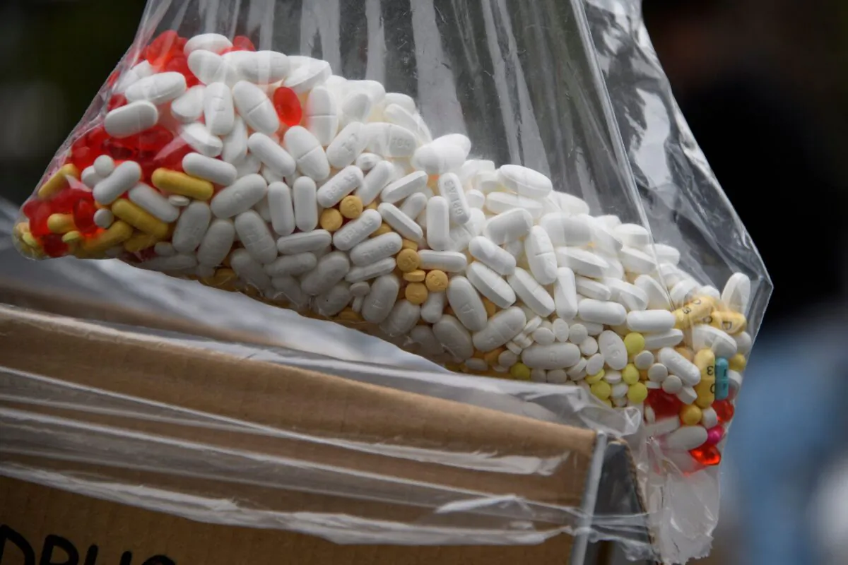 A bag of assorted pills and prescription drugs dropped off for disposal is displayed during the Drug Enforcement Administration (DEA) 20th National Prescription Drug Take Back Day at Watts Healthcare in Los Angeles, Calif., on April 24, 2021. (Patrick T. Fallon / AFP via Getty Images)