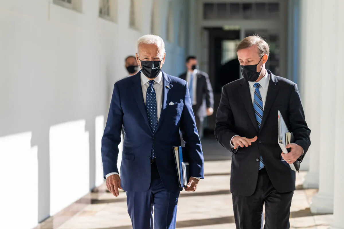 President Joe Biden walks with National Security Adviser Jake Sullivan along the West Colonnade, on Oct. 18, 2021, on their way to the White House Situation Room. (Adam Schultz/Official White House Photo/Flickr)