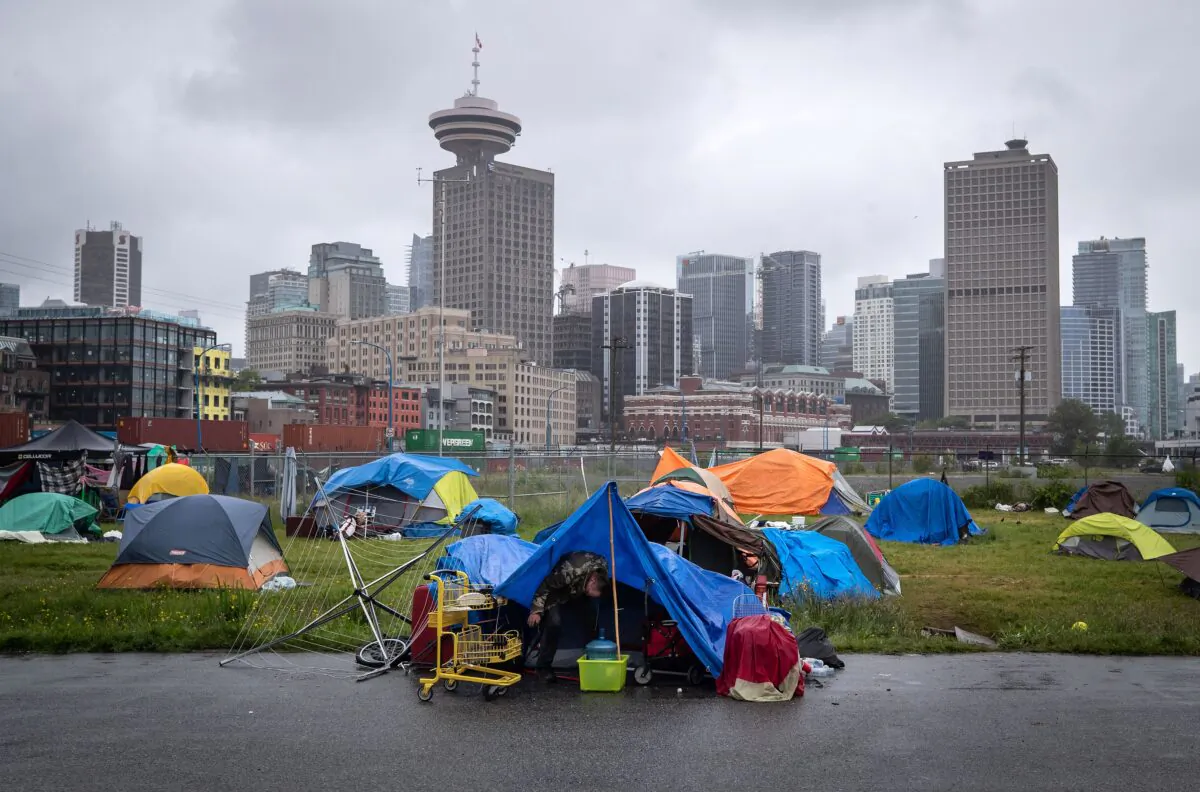 A homeless camp on Port of Vancouver property adjacent to Crab Park, in Vancouver on June 10, 2020. (Darryl Dyck/The Canadian Press)