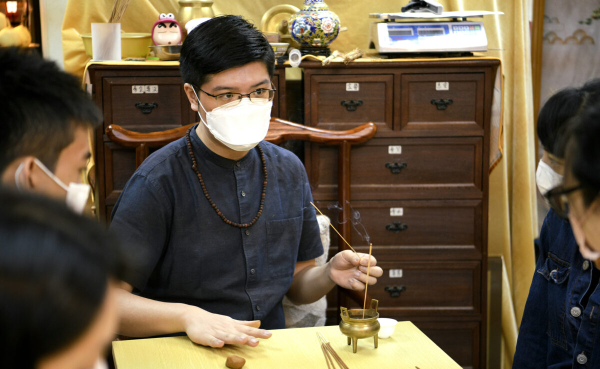 Aaron talks about incense making and his incense products in August 2021. Aaron has been “searching for incense” since he was 15 and started making his own 10 years ago. He has an incense company and is committed to promoting incense culture. (Hui Tat/The Epoch Times). 