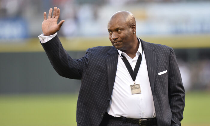 Former Chicago White Sox and Kansas City Royals player and Heisman Trophy winner Bo Jackson waves to the crowd as as he is introduced before the 2013 Civil Rights Game between the Chicago White Sox and the Texas Rangers at U.S. Cellular Field in Chicago on Aug. 24, 2013. (Brian Kersey/Getty Images)