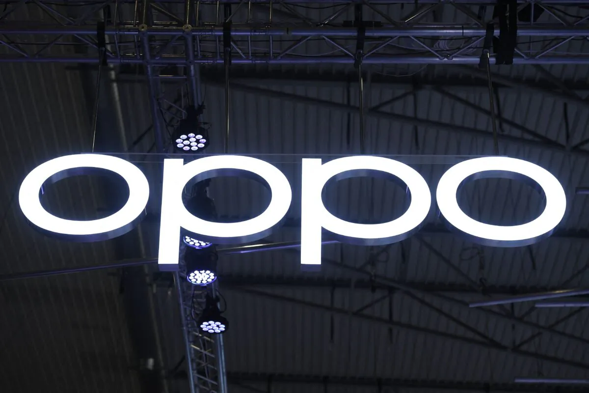 A OPPO logo is displayed at the MWC (Mobile World Congress) in Barcelona on March 2, 2022. (Photo by Josep Lago/AFP via Getty Images)