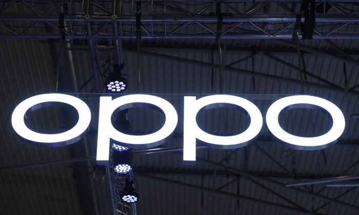 The Oppo logo is displayed at the MWC (Mobile World Congress) in Barcelona on March 2, 2022. (Josep Lago/AFP via Getty Images)