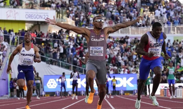Canada's Andre De Grasse wins the final in the men's 4x100-meter relay at the World Athletics Championships in Eugene, Ore, on July 23, 2022, . (AP Photo/Ashley Landis)
