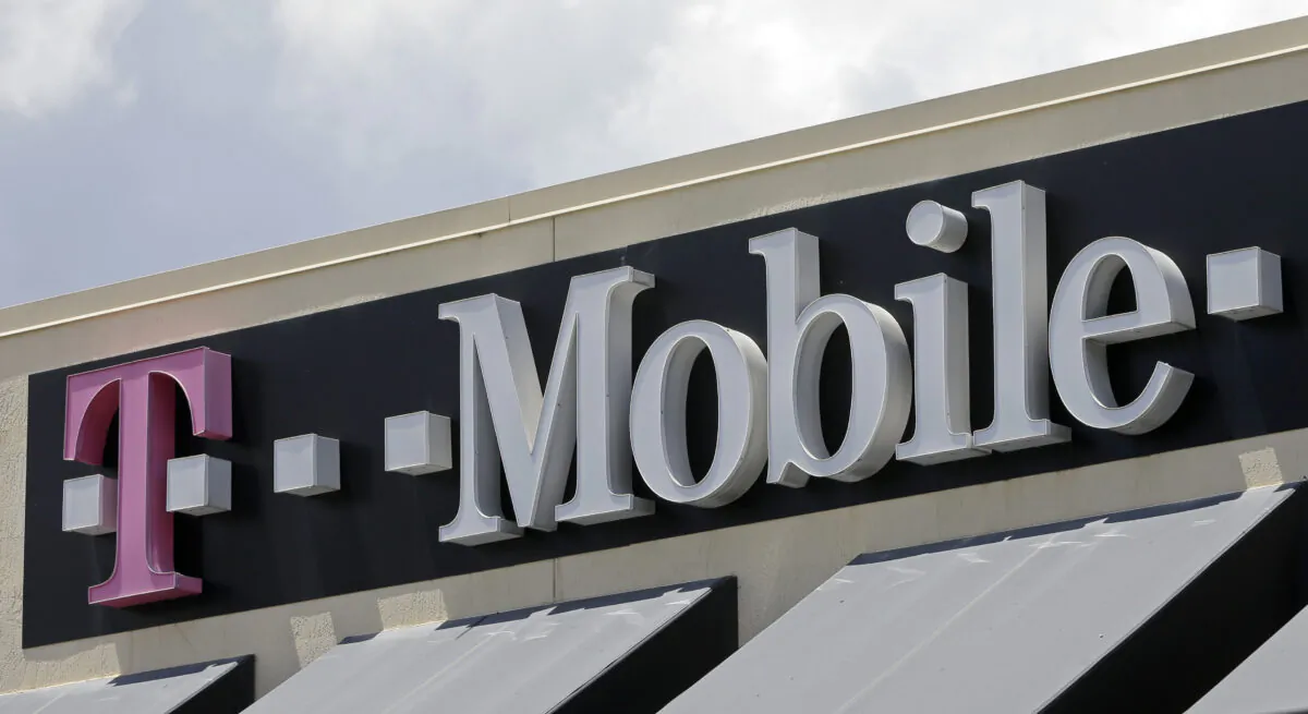 T-Mobile sign at a store in Hialeah, Fla., on July 27, 2017. (Alan Diaz/AP Photo)