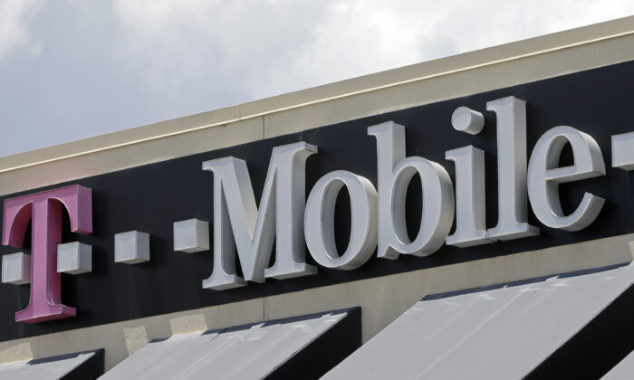 T-Mobile sign at a store in Hialeah, Fla., on July 27, 2017. (Alan Diaz/AP Photo)