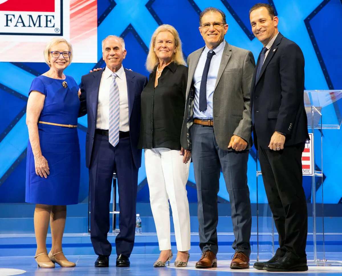 (L–R) Perry Smith, granddaughter of the late Jack Graney, who received the Ford C. Frick Award for broadcasting, writer Tim Kurkjian, who was honored with the Baseball Writers' Association of America's Career Excellence Award, Hall of Fame Chairman Jane Forbes Clark, BBWAA president Larry Stone, and Hall of Fame President Josh Rawitch pose on stage at the Opera Theater in Cooperstown, N.Y., on July 23, 2022. (Milo Stewart Jr./National Baseball Hall of Fame and Museum via AP)
