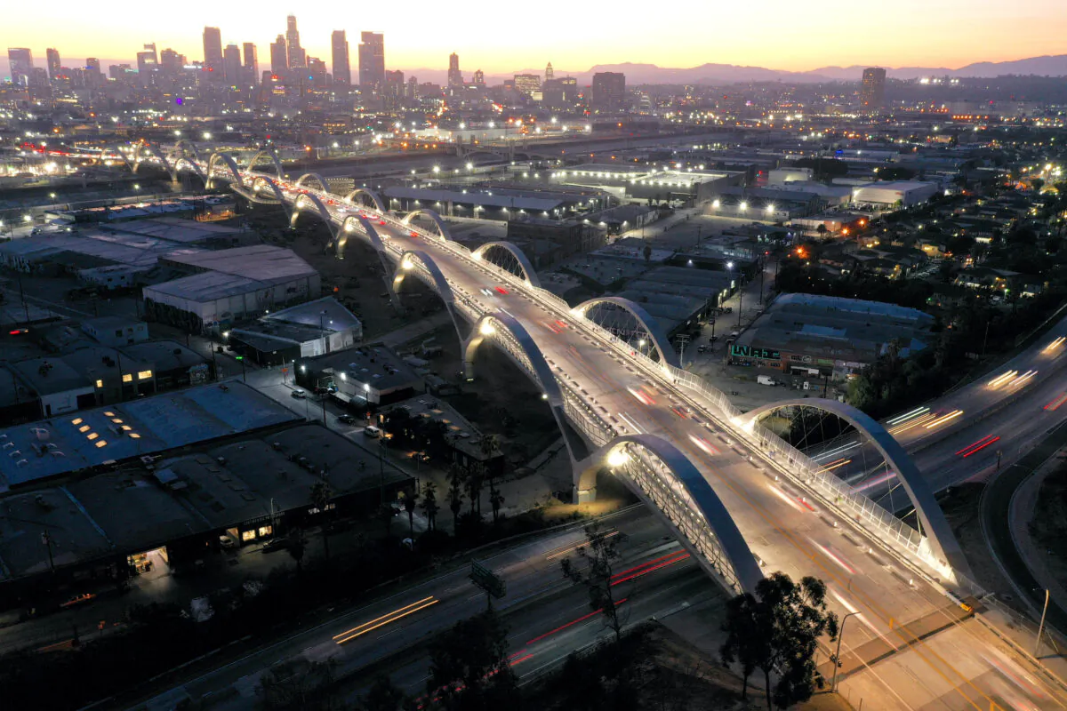 An aerial view of vehicles passing over the newly-opened 6th Street Viaduct, connecting Boyle Heights with downtown L.A., Calif., on July 11, 2022. (Mario Tama/Getty Images)