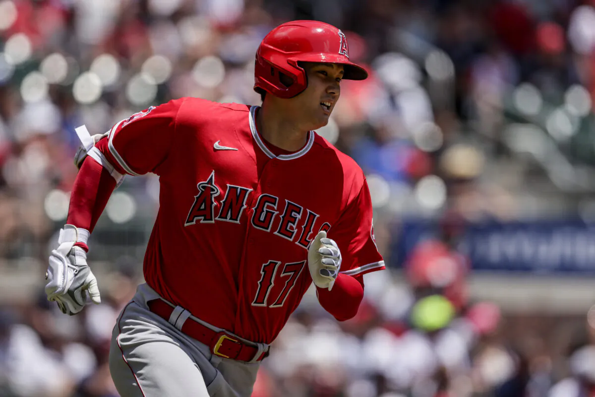 Los Angeles Angels' Shohei Ohtani runs toward first as he flies out during the first inning of a baseball game against the Atlanta Braves, in Atlanta, on Sunday, July 24, 2022. (Butch Dill/AP Photo)