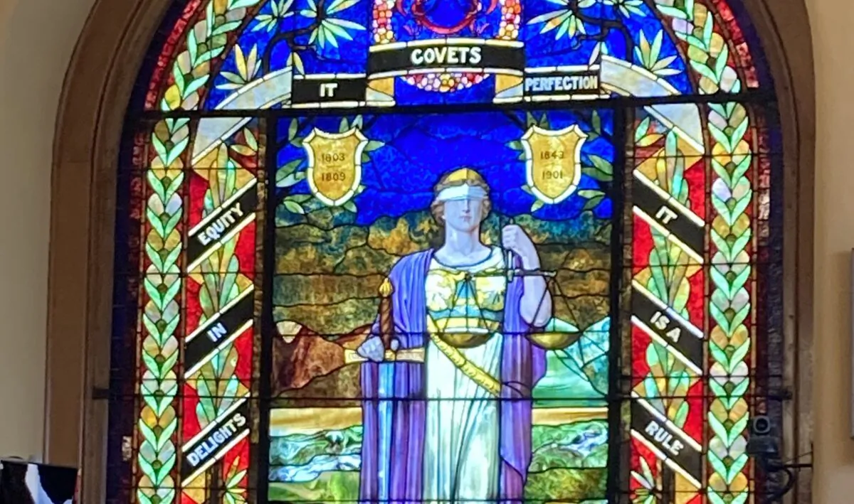 This stained-glass window depicts "lady justice" in the Xenia, Ohio, courthouse on July 22, 2022. David Lee Myers was convicted of murder in this courthouse in 1996. He protests his innocence. (Janice Hisle/The Epoch Times)