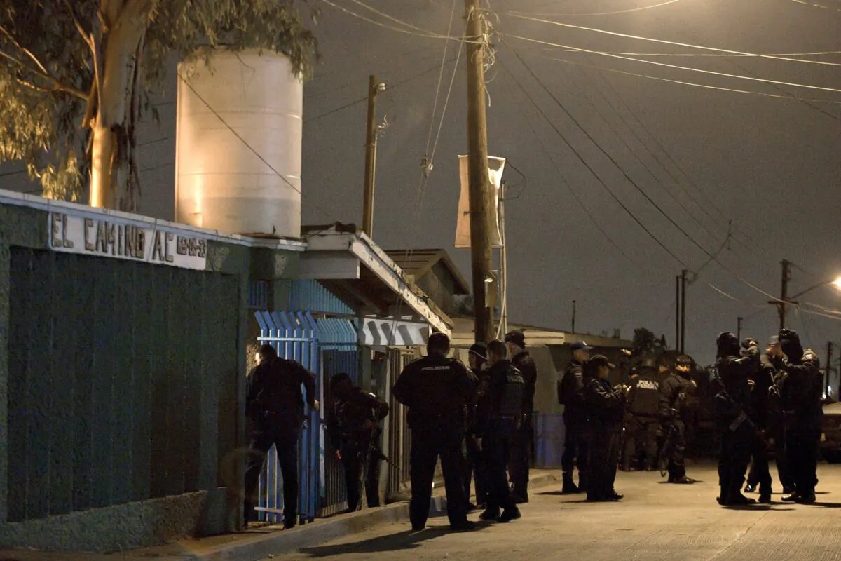 Members of the Mexican Federal Police stand guard in front of a rehab center in Tijuana, Mexico, in a file photo. (Francisco Vega/AFP via Getty Images)