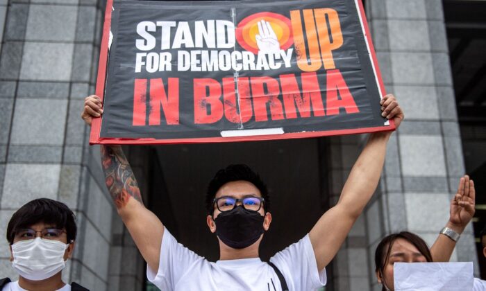 Activists including Burmese nationals take part in a rally to protest against Burma's junta execution of four prisoners, including a former lawmaker from Aung San Suu Kyi's party, outside the United Nations University in Tokyo on July 26, 2022. (Philip Fong/AFP via Getty Images)