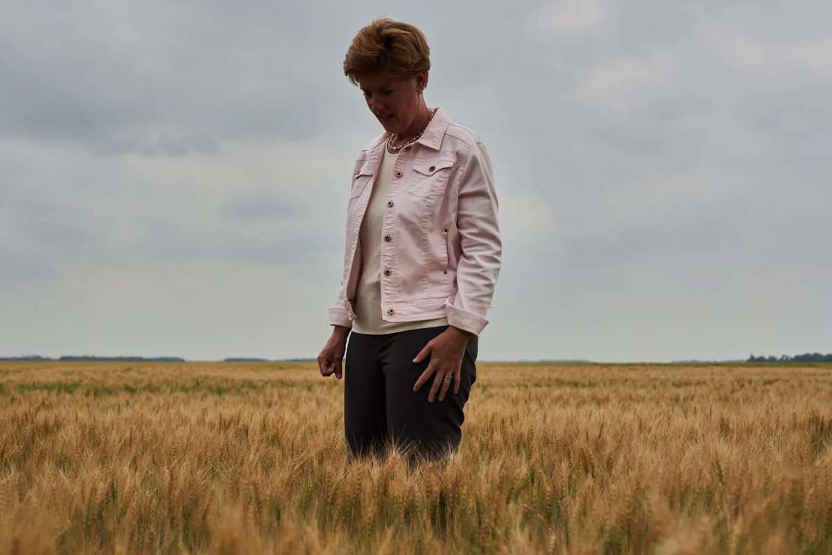 Federal Agriculture Minister Marie-Claude Bibeau tours a grain farm in the Interlake Region of Manitoba on July 22, 2021. (The Canadian Press/David Lipnowski)