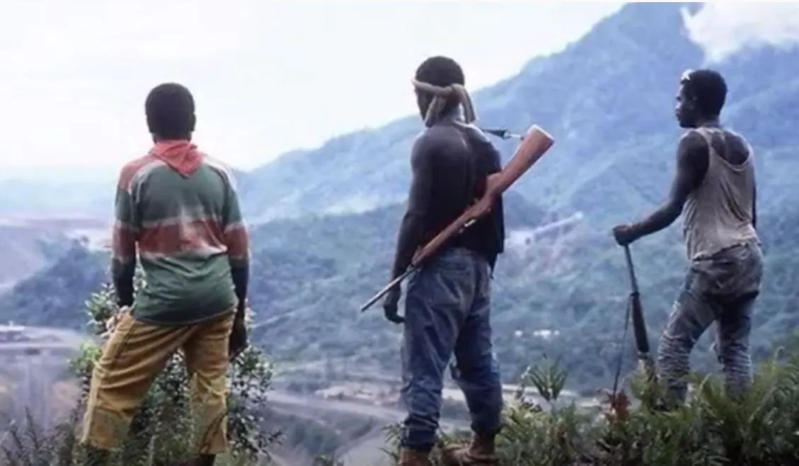 Locals overlooking the site of the Panguna Mine in Bougainville. (Courtesy of John D Kuhns.)