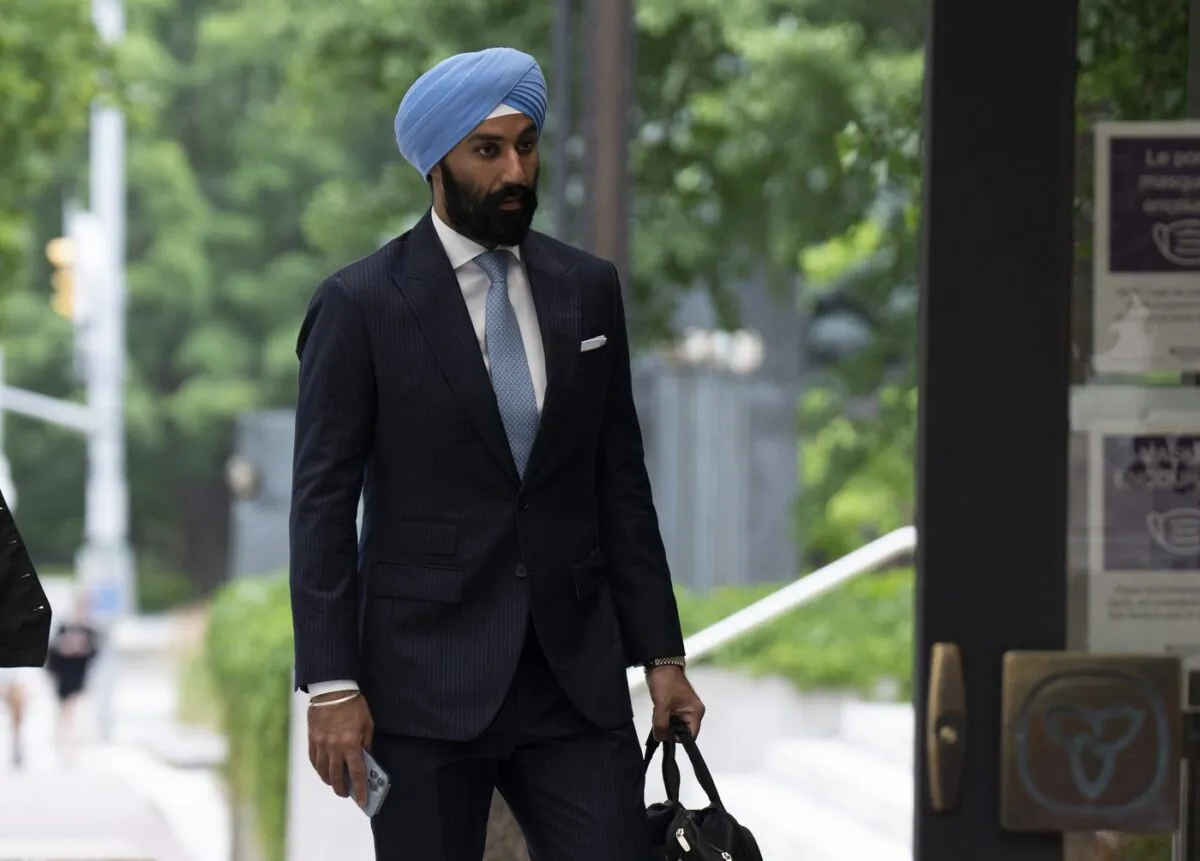 Former Liberal MP Raj Grewal makes his way to court, July 18, 2022 in Ottawa. (The Canadian Press/Adrian Wyld)