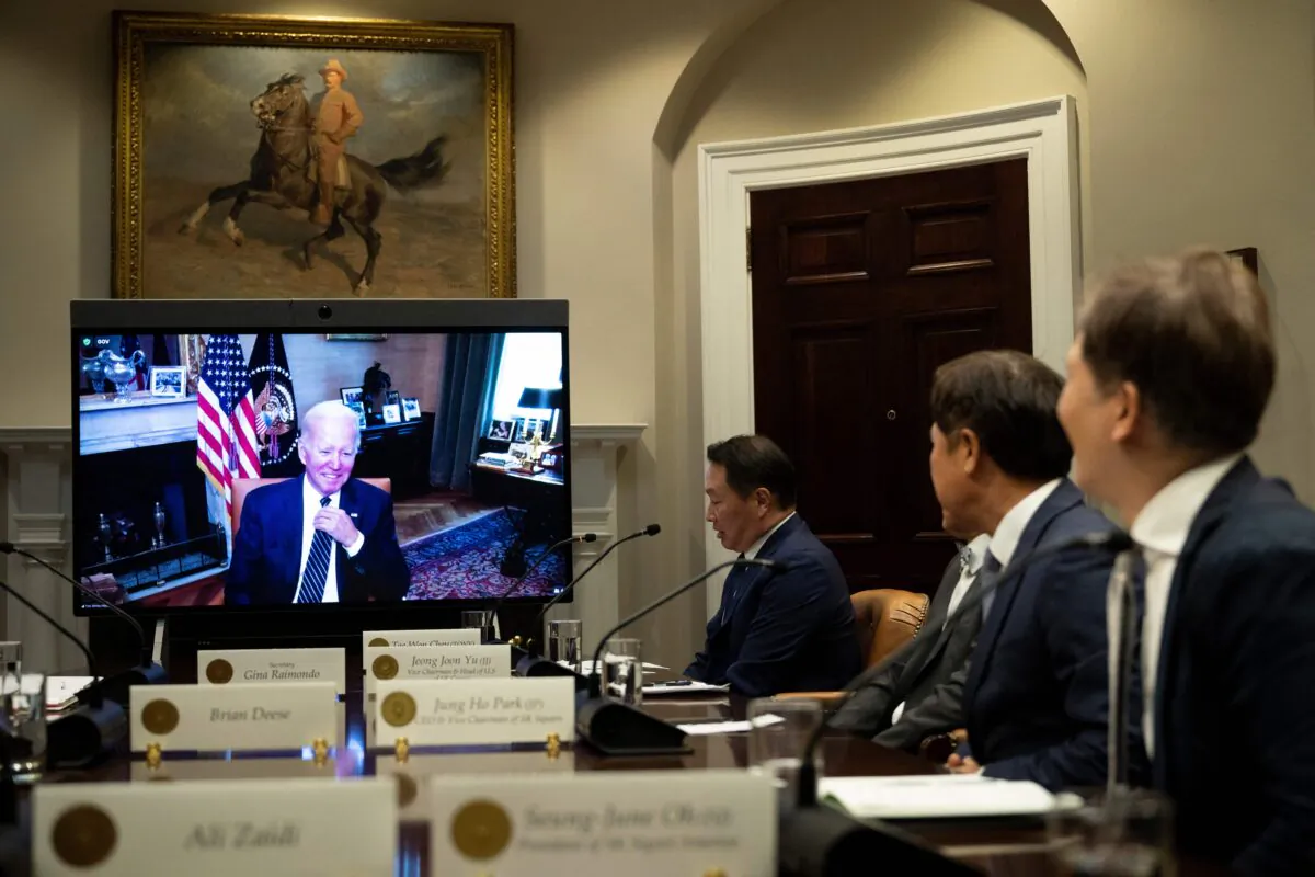 US President Joe Biden meets vitually with the Chairman and Principal Owner of SK Group Chey Tae-won in the Roosevelt Room of the White House in Washington on July 26, 2022. (Brendan Smialowski/AFP via Getty Images)