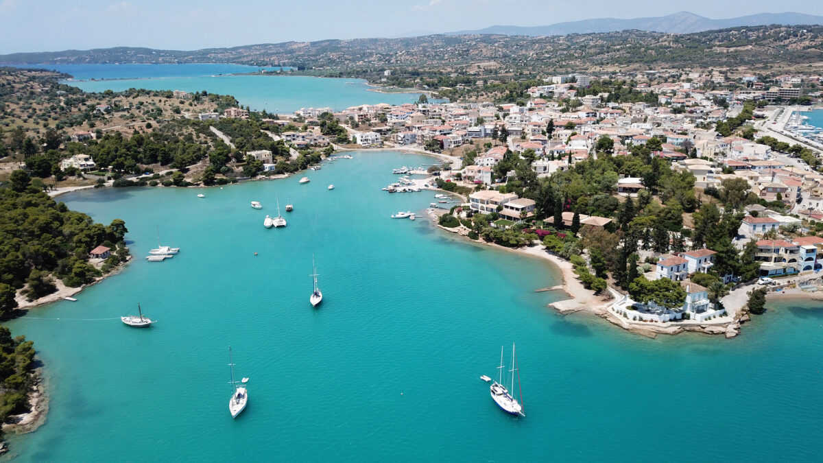 As tourists head to the usual Greek islands, it may be worth finding an off-the-beaten-path option—such as Porto Heli. (Aerial-motion/Shutterstock)