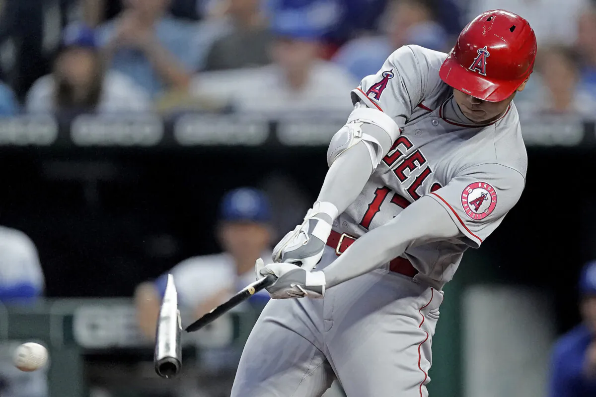 Los Angeles Angels' Shohei Ohtani breaks his bat as he hits a foul ball during the fifth inning of a baseball game against the Kansas City Royals in Kansas City, Mo., on July 26, 2022. (Charlie Riedel/AP Photo)