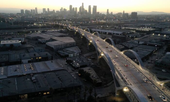 An aerial view of vehicles passing over the newly-opened 6th Street Viaduct, connecting Boyle Heights with downtown L.A., on July 11, 2022.  (Mario Tama/Getty Images)